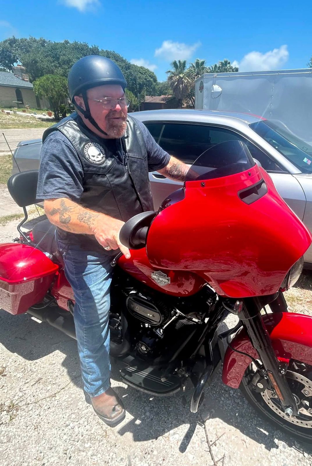 Neil on his red Harley