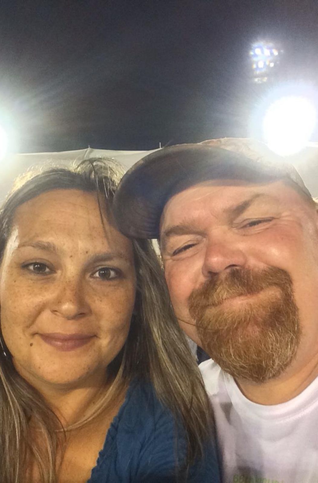 Close-up selfie of Neil and Jamie smiling