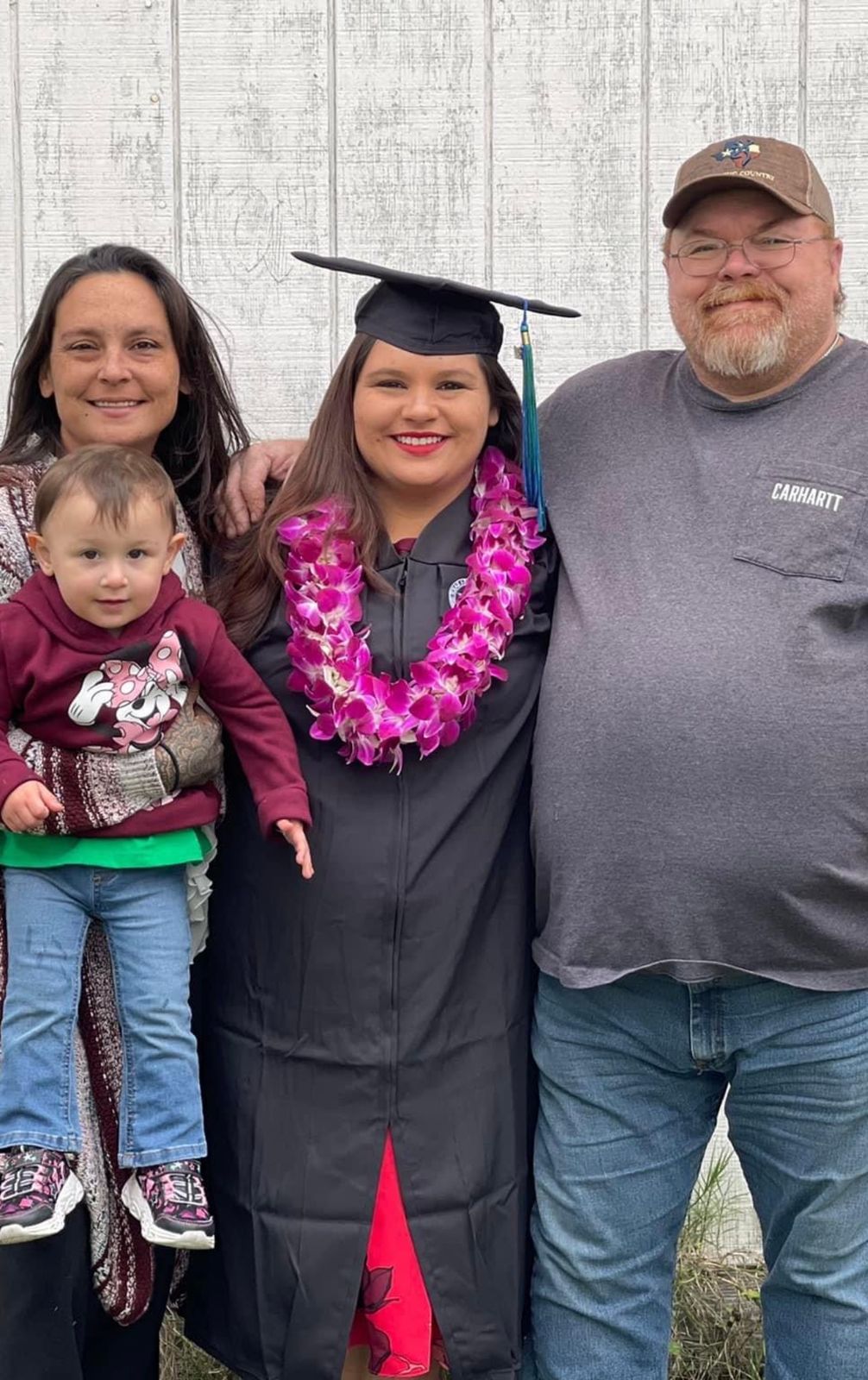 Neil at a graduation celebration with family