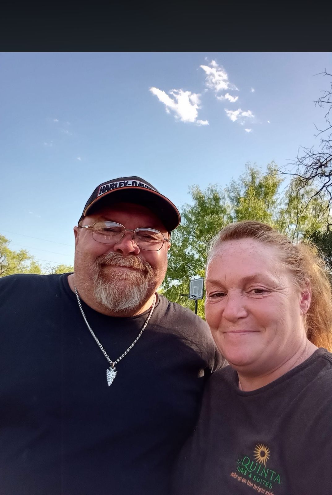 Close-up of Neil and a loved one smiling
