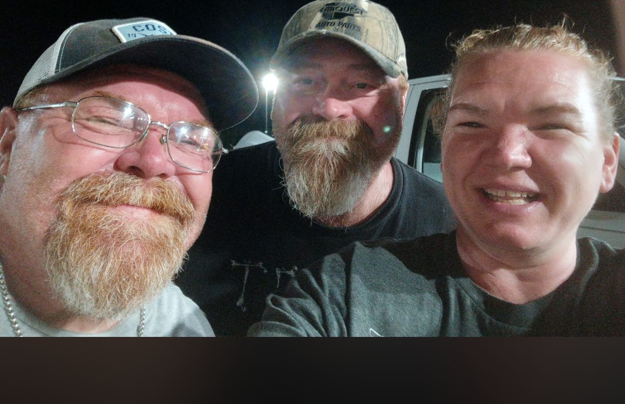 Selfie of Neil with two friends